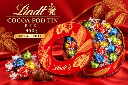 LINDT COCOA POD TIN RED 450G-AUTO WIN 06/10